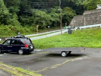 0921kddi1 326x245 - KDDIとアイサンテクノロジー、自動運転車からドローンが離着する物流実証に成功