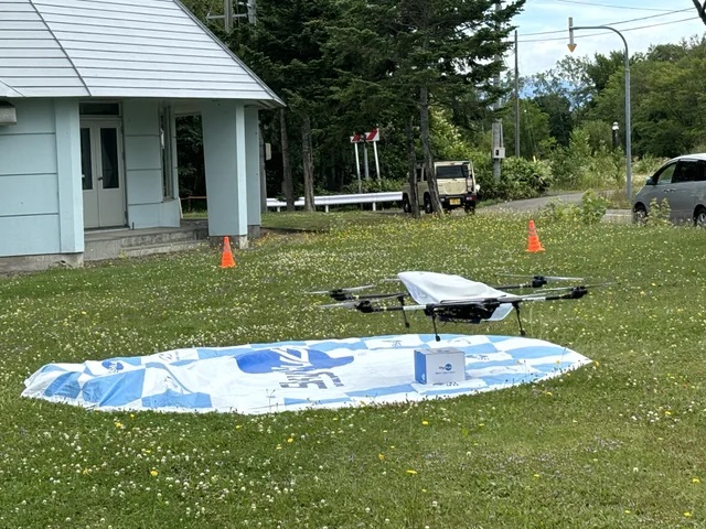 0726aeronext2 - エアロネクストなど3社、北海道・新十津川町でドローン活用物流「スカイハブ」開始