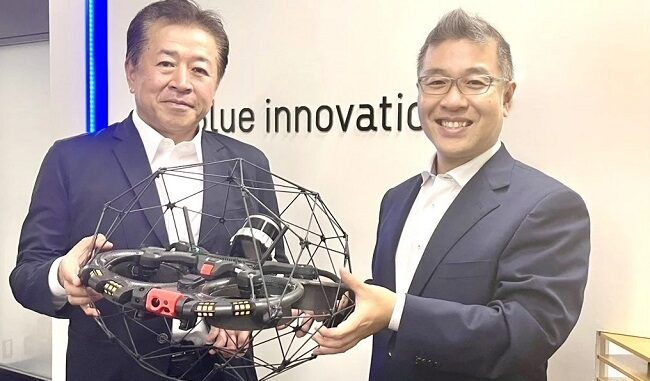 0724nttedt 滝澤正宏・NTTイードローン社長(左)、熊田貴之・ブルーイノベーション社長